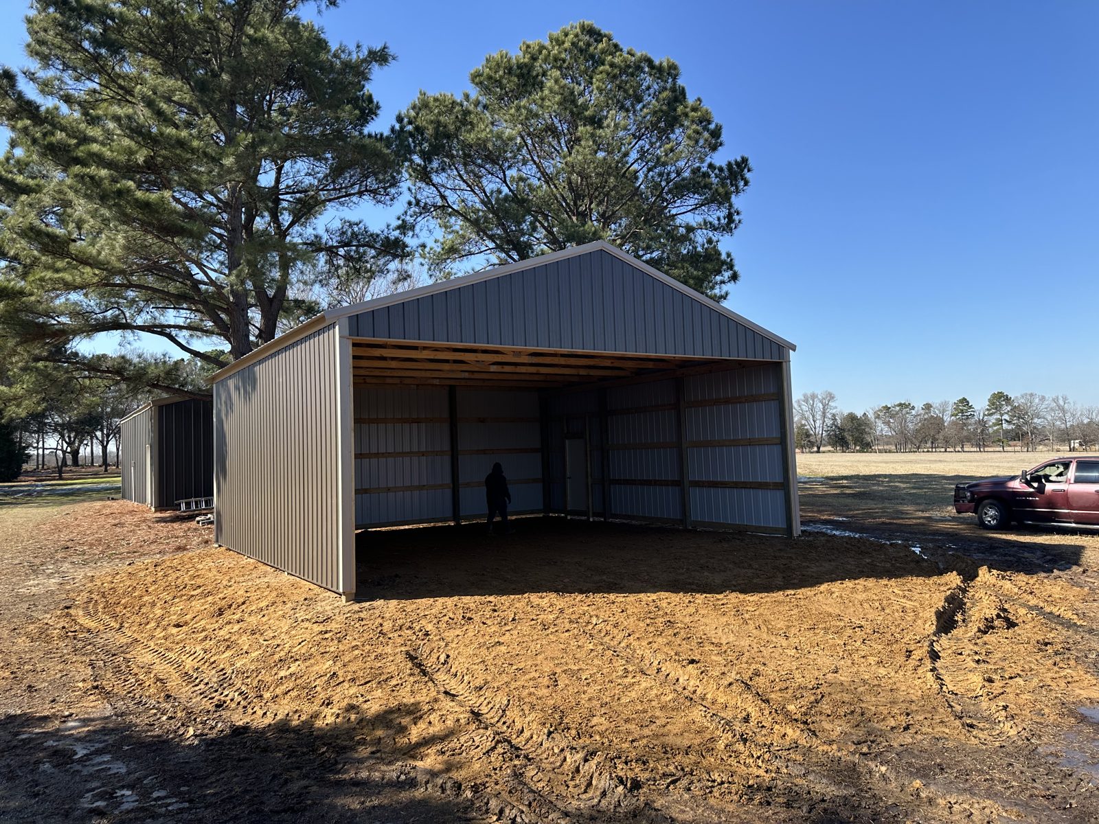 Finished metal pole barn for tractors and ATVs in East Texas