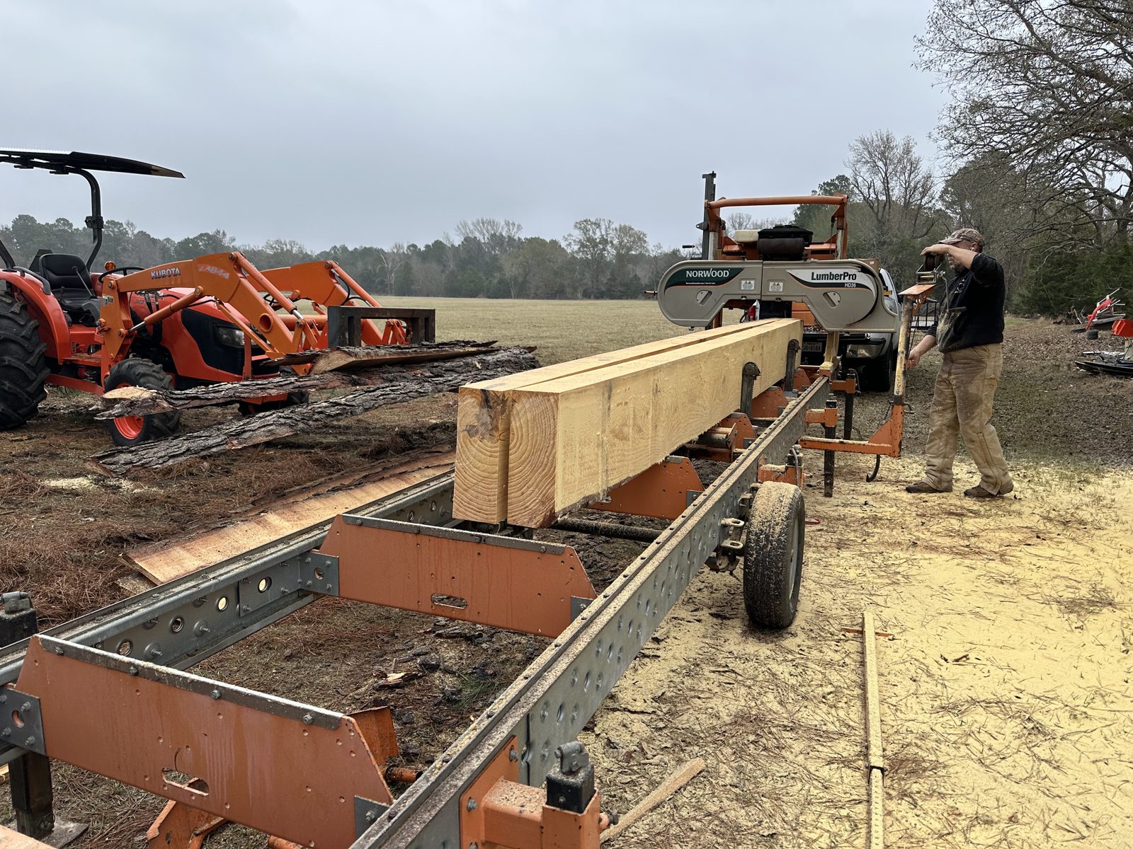 Fresh cut beam on a portable sawmill in East Texas