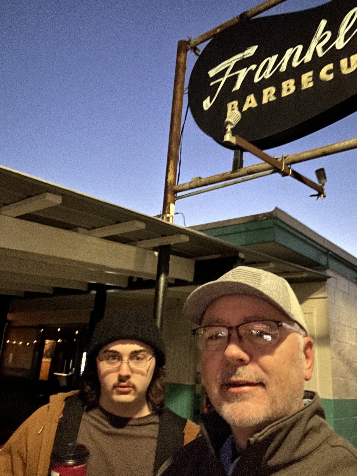 Greg McKinney and his son at Franklin Barbecue in Austin, Texas